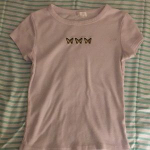 white t shirt with butterfly pattern